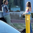 *EXCLUSIVE* Gerard Butler chats with a mystery girl while out with his dog in Malibu