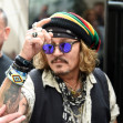 The American Actor Johnny Depp and Jeff Beck seen leaving their Manchester Hotel.