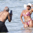 *EXCLUSIVE* *WEB MUST CALL FOR PRICING* The American actor Danny Glover is spotted finding the heat a little too much as he cools down in the sea with his wife Eliane Cavalleiro on his holidays in Sardinia