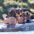 *EXCLUSIVE* *WEB EMBARGO UNTIL JULY 4, 2022 8:30 PM ET* Olivia Jade Giannulli and her sister Bella were spotted on the lake with Patrick and Christopher Schwarzenegger over the Fourth of July Holiday - ** WEB MUST CALL FOR PRICING **