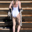 *EXCLUSIVE* *WEB MUST CALL FOR PRICING* Grey's Anatomy star Ellen Pompeo, 52, showcases her amazing figure in a skimpy white swimsuit as she enjoys a dip in the sea during a sun-soaked family trip to Sardinia.