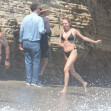 *EXCLUSIVE* 'Boogie Nights' actress Heather Graham slips into a black bikini for a beachside frolic next to mystery man
