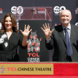 Producers Michael G. Wilson And Barbara Broccoli Place Their Handprints In Cement At The TCL Chinese Theatre