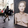 World Breast Cancer Day. Mural by Angelina Jolie with signs of mastectomy - Milan, Italy - 19 Oct 2022