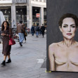 World Breast Cancer Day. Mural by Angelina Jolie with signs of mastectomy - Milan, Italy - 19 Oct 2022