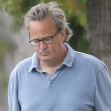 A cleaned-up Matthew Perry is seen in a rare public outing as he leaves a house in Los Angeles following a two-hour visit with friends.