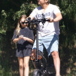 *PREMIUM-EXCLUSIVE* A healthy looking Jeremy Renner spotted on an electric scooter while with his daughter only three months after his horrific snow plow accident!