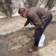 Arnold Schwarzenegger has taken it upon himself to fill two potholes