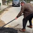 Arnold Schwarzenegger has taken it upon himself to fill two potholes