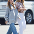EXCLUSIVE: Kevin Costner's wife Christine Baumgartner gets two huge bouquets of birthday balloons for their son's 16th birthday while out with Grace Saturday