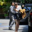 EXCLUSIVE: Mila Jovovich shows of an interesting new hairstyle as she arrives at the Four Seasons