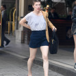 EXCLUSIVE: Mila Jovovich shows of an interesting new hairstyle as she arrives at the Four Seasons