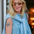 Melanie Griffith tatuaj