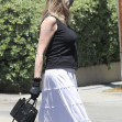 *EXCLUSIVE* Melanie Griffith shows off her new tattoo that replaced her ex-partner's name***web must call for pricing***