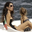 George Clooney and Amal Clooney, accompanied by their sleepy kids Ella and Alexander, embark on a picturesque boat trip in Como