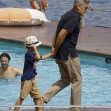 George Clooney and Amal Clooney, accompanied by their sleepy kids Ella and Alexander, embark on a picturesque boat trip in Como