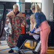 EXCLUSIVE: **PREMIUM EXCLUSIVE RATES APPLY** Bruised And Battered Tori Spelling Leaves The Hospital In A Wheelchair With Visible Marks On Her Face And Arms After Mystery Accident