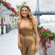 Blake Lively Wearing A Gold Outfit At MK Fashion Show In NYC