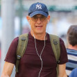 EXCLUSIVE: Yankees Fan Tom Hanks Is Spotted On A Phone Call While Walking Around In New York