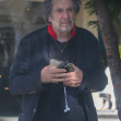 EXCLUSIVE: Al Pacino Seen Leaving The Four Seasons With his Shrek Phone case