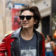 EXCLUSIVE: Timothee Chalamet Rocks A Colorful Celine Jacket In Paris After Getting Caught Holding Kylie Jenner Hand Wearing A Ring On Her Engagement Finger