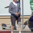 Alan Ruck is seen for the first time since crashing his car, visiting a liquor store in LA