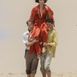 EXCLUSIVE: *NO DAILYMAIL ONLINE* â€�Bombshellâ€™ Ana De Armas Looks Glamorous As She Is Carried By Her Costars While Filming Scenes On A Gold Coast Beach In Australia For Her Role In Ron Howard's 'Survival Thriller' Film, "Edenâ€ť