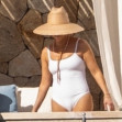 *PREMIUM-EXCLUSIVE* Reese Witherspoon heats up Mexico vacay in a white one-piece as she celebrates first holiday since split from Jim Toth