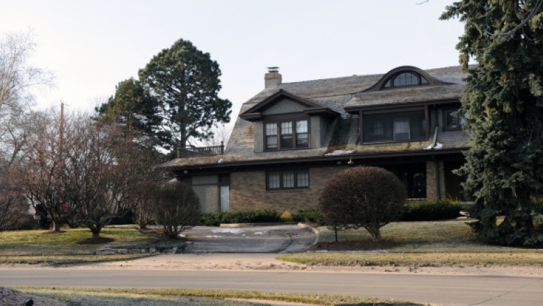 GALERIE FOTO Warren Buffett încă locuiește în casa cumpărată cu 31.000 de dolari în 1958. Are o avere de 103 miliarde de dolari