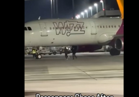 Imagini virale cu doi români care aleargă pe pista aeroportului din Koln pentru a prinde avionul spre București