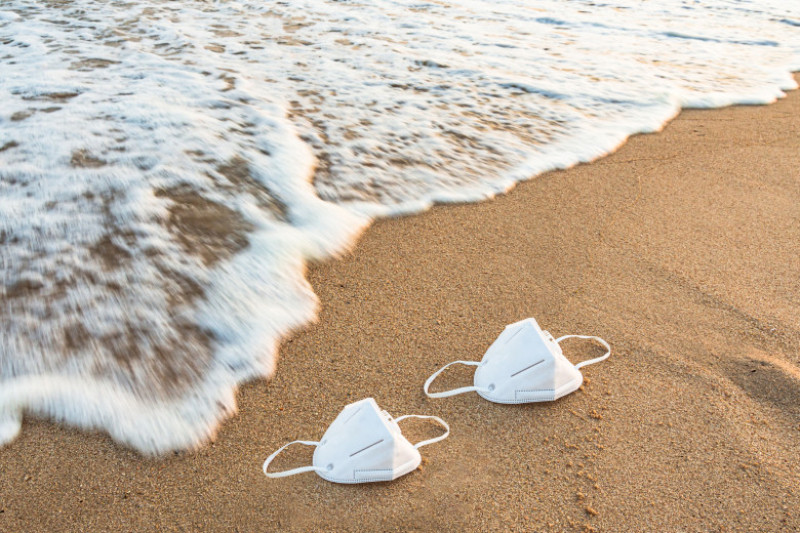 Medical mask, Medical protective mask on the beach.