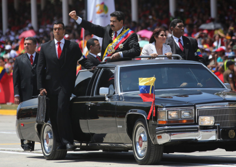 Venezuelans Loyal To Former President Hugo Chavez Mark One Year Anniversary Of His Death