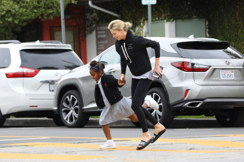 *EXCLUSIVE* Charlize Theron enjoys a Menchie's frozen yogurt with son Jackson