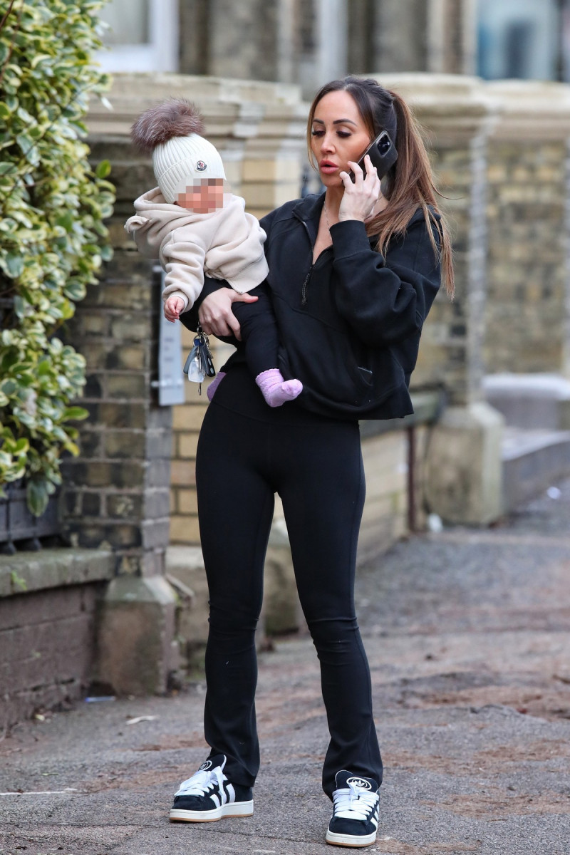 EXCLUSIVE: Lauryn Goodman Carries Her Baby Daughter On A Coffee Run Following Reports That Kyle Walker IS The Tot's Father