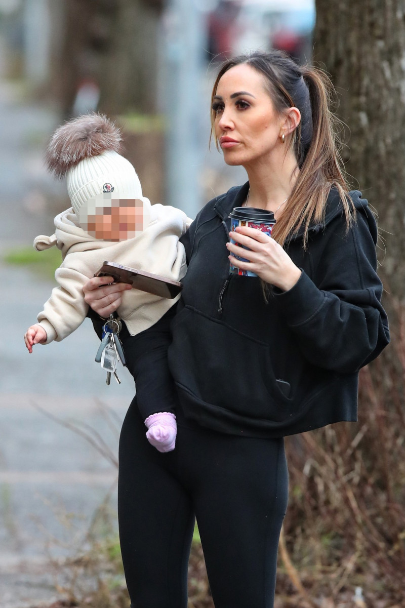 EXCLUSIVE: Lauryn Goodman Carries Her Baby Daughter On A Coffee Run Following Reports That Kyle Walker IS The Tot's Father
