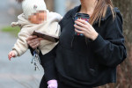 EXCLUSIVE: Lauryn Goodman Carries Her Baby Daughter On A Coffee Run Following Reports That Kyle Walker IS The Tot's Father