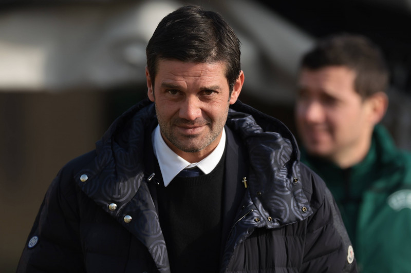 Milan, Italy, 12th December 2023. Cristian Chivu Head coach of Internazionale reacts as he makes his way to the bench fo