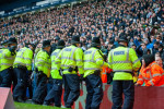 West Bromwich Albion v Wolverhampton Wanderers Emirates FA Cup Police form a line in front of fans during the Emirates F
