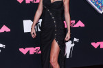 Taylor Swift wearing a Versace dress arrives at the 2023 MTV Video Music Awards