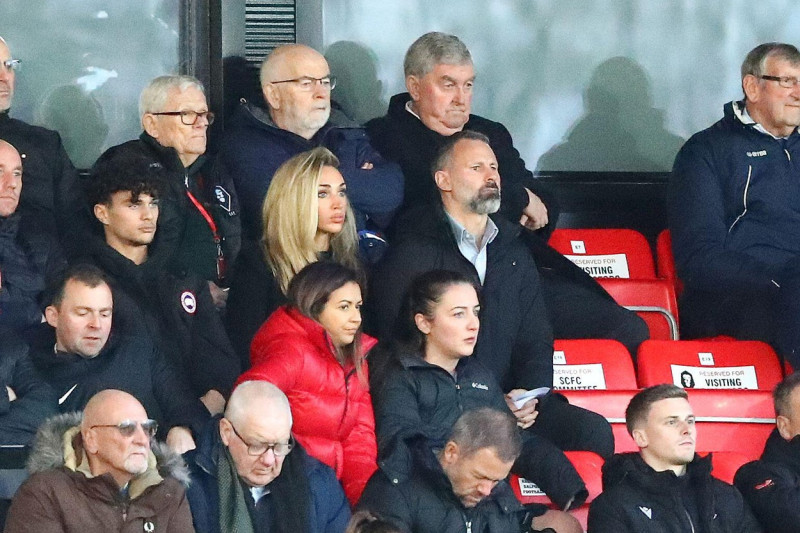 Ryan Giggs (right) and his partner Zara Charles in the stands during the Sky Bet League Two match at the Peninsula Stadium, Salford. Picture date: Saturday November 19, 2022.