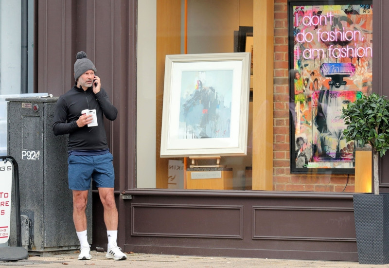 *EXCLUSIVE* Former Manchester United footballer Ryan Giggs pictured with a tape measurer while seen rocking a Beanie Hat and Shorts during a stroll in Trafford, Manchester.