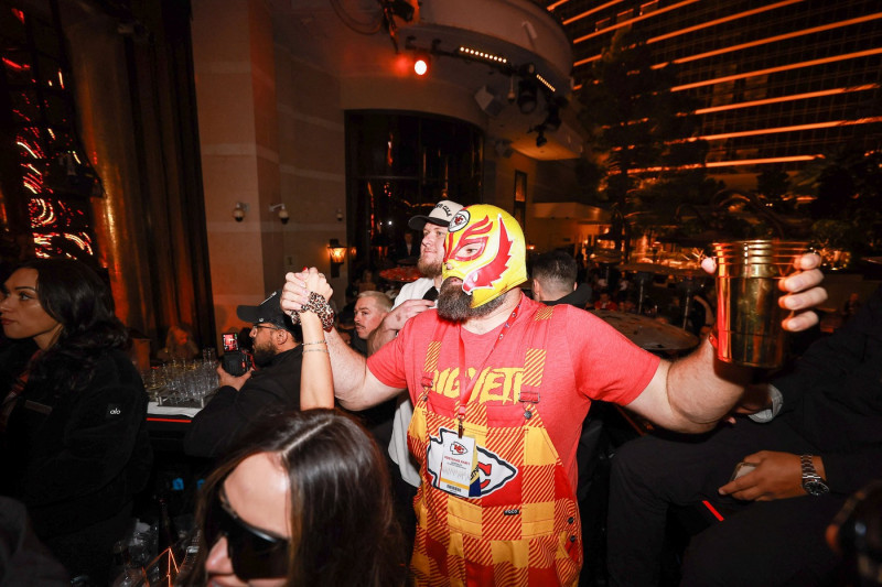 Patrick Mahomes and Jason Kelce - wearing a lucha libre wrestling mask - celebrate Kansas City Chiefs’ Super Bowl win at XS Nightclub at Wynn Las Vegas