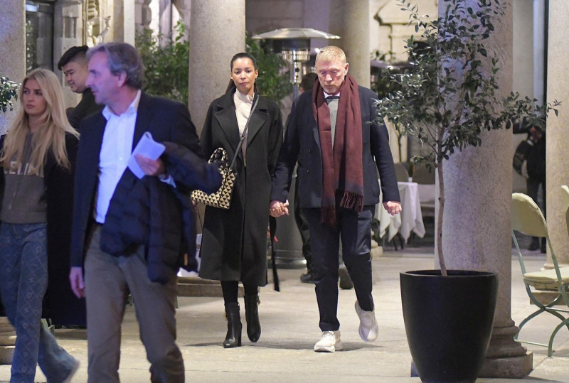 *EXCLUSIVE* Former German Tennis Legend Boris Becker enjoys a puff on his cigar at the dining table during lunch with a few friends and girlfriend Lilian de Carvalho Monteiro.