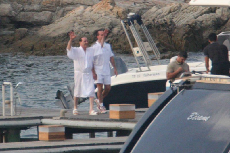 silvio berlusconi on bathrobe