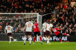 Luton Town FC v Manchester City FC players watch on as Luton Town s Jordan Clark scores their side s second goal of the