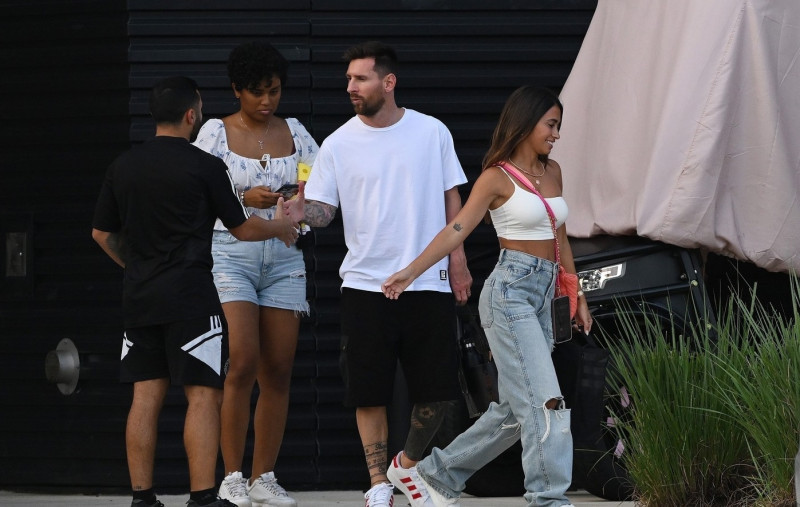 *EXCLUSIVE* Lionel Messi is seen with wife Antonella who has been going viral after his games! Fans can't get enough of the Argentinian stunner! **Web Must Call For Pricing**