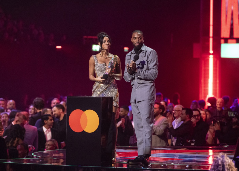 Vick Hope and Ivan Toney presenting the BRIT Award for Producers of the Year at the 2024 BRIT Awards at The O2 Arena, London on 2 March 2024