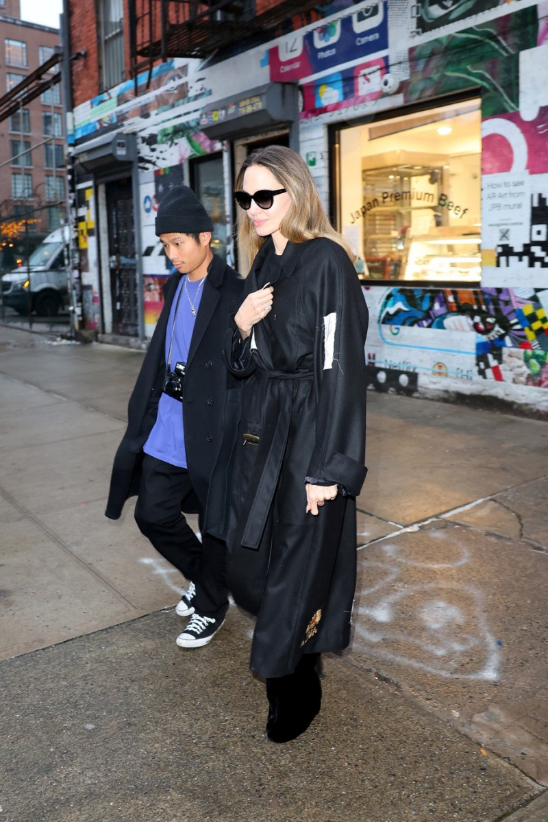 Angelina Jolie and son Pax step out from Soho store