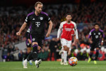 Harry Kane of Bayern Munich scores his sides second goal from the penalty spot during the UEFA Champions League Quarter-