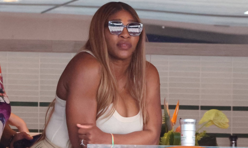 MIAMI GARDENS, FLORIDA - MARCH 29: Serena Williams tries on daughters extra small Barbi Jacket in VIP suite with Demarri